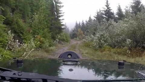 Windy rainy off road driving Stock Footage 172560899
