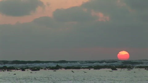 A windy sunrise on a distant reef Stock Footage 65412
