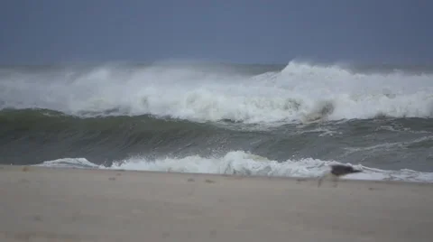 Windy waves on a beach in slow motion Stock Footage 67479215