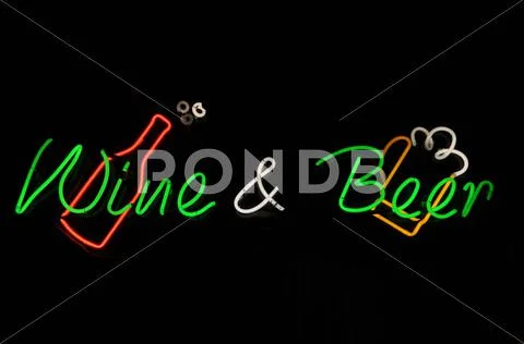 Wine and beer neon sign Stock Photos