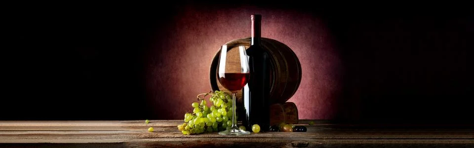 Wine and cask on table Stock Photos
