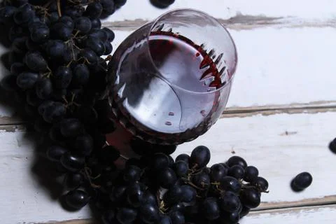 Wine and fruit on the table Stock Photos