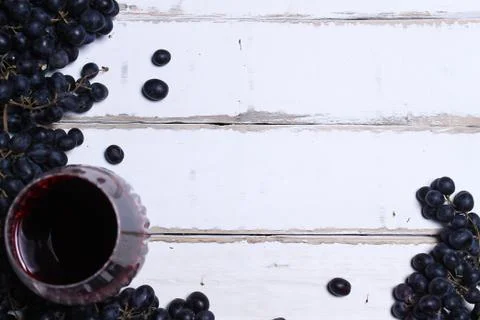 Wine and fruit on the table Stock Photos