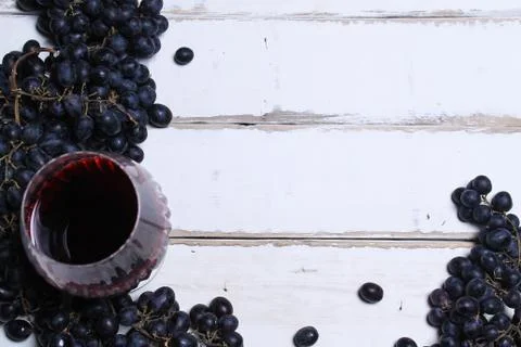 Wine and fruit on the table Stock Photos