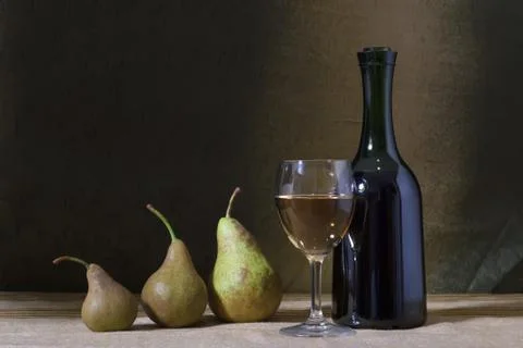 Wine and pears Stock Photos