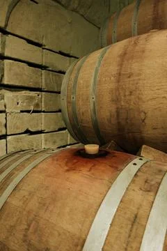 Wine barrels in the basement Stock Photos