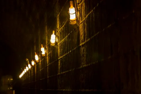 Wine barrels stacked in the cellar Stock Photos