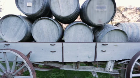 Wine Barrels on top of a carriage Stock Footage 36807722