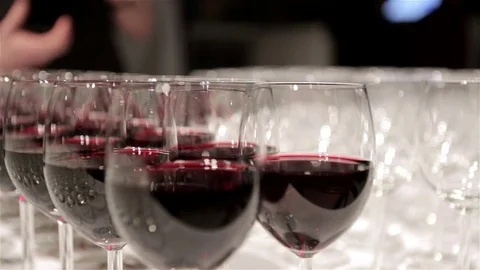 Wine being poured into glasses Stock Footage 82076521