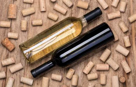 Wine bottle and corks Stock Photos