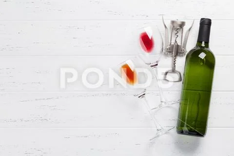 Wine bottle and glasses Stock Photos