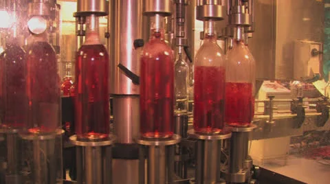 Wine bottle being filled Stock Footage 23213558