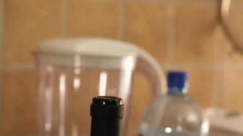 Wine bottle opening with corkscrew Stock Footage 35921700