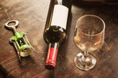 Wine bottle in a rustic place Stock Photos