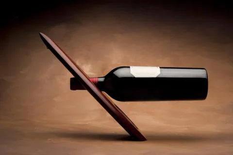 Wine bottle on stand Stock Photos