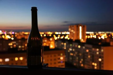 Wine bottle at sunset Stock Photos