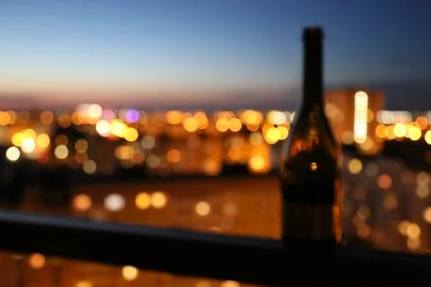 Wine bottle at sunset Stock Photos