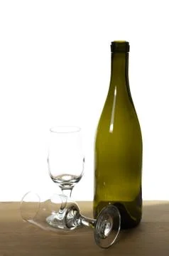 Wine bottle on a table with glasses Stock Photos