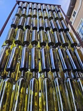 Wine bottles arranged vertically in a pattern as a work of art in Napa Stock Photos