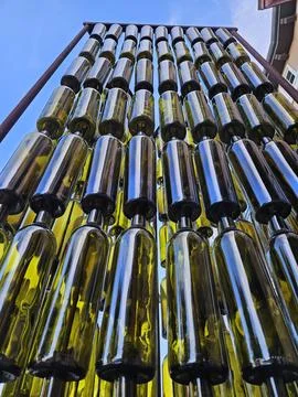 Wine bottles arranged vertically in a pattern as a work of art in Napa Stock Photos