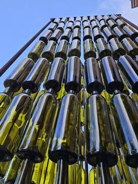 Wine bottles arranged vertically in a pattern as a work of art in Napa Stock Photos