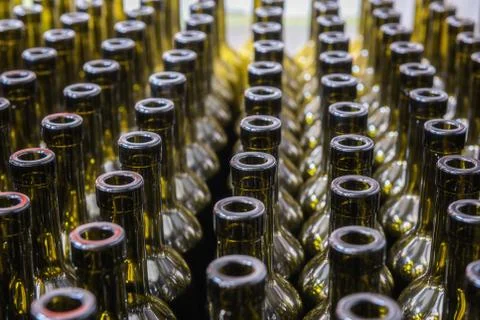 Wine bottles background, winemaking process, preparing wine for bottling in a 库存照片