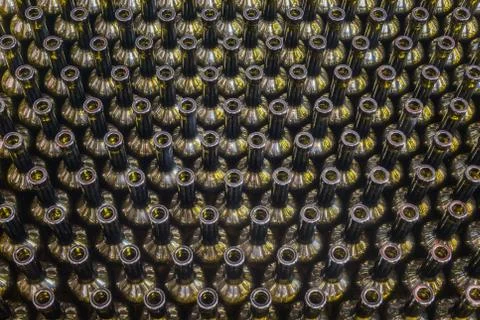 Wine bottles background, winemaking process, preparing wine for bottling in a 库存照片