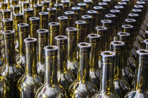 Wine bottles background, winemaking process, preparing wine for bottling in a Stock Photos