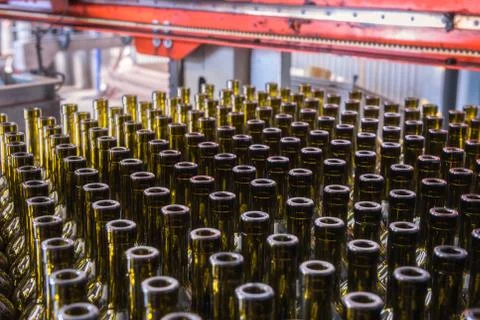 Wine bottles background, winemaking process, preparing wine for bottling in a Stock Photos