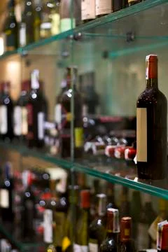 Wine bottles in the bar Stock Photos