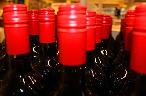 Wine bottles in a box close up. Box with bottles of drink in a wooden box on a Stock Photos