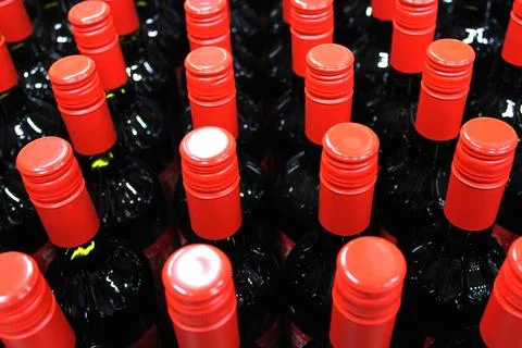 Wine bottles in a box close up. Box with bottles of drink in a wooden box on a Stock Photos