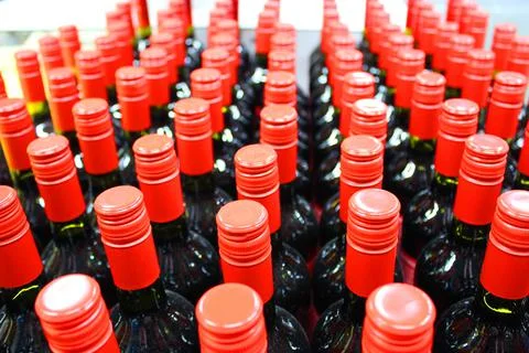 Wine bottles in a box close up. Box with bottles of drink in a wooden box on a Stock Photos