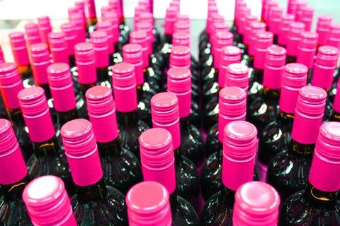 Wine bottles in a box close up. Box with bottles of drink in a wooden box on a Stock Photos
