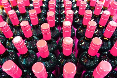 Wine bottles in a box close up. Box with bottles of drink in a wooden box on a Stock Photos
