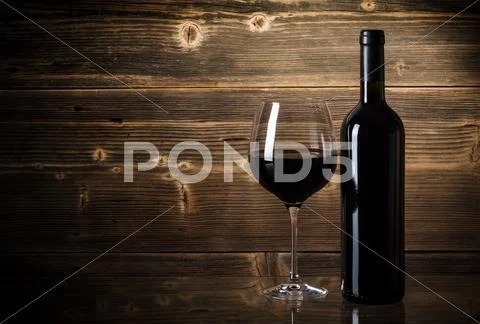 Wine bottles with glass Stock Photos