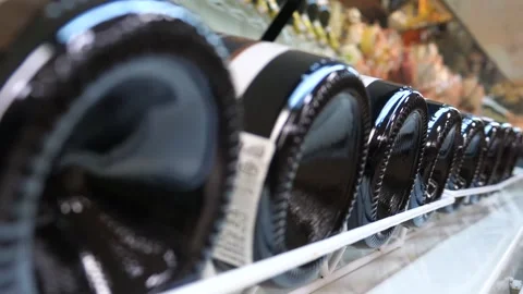 Wine bottles laid in a row in a cellar Stock Footage 309474460