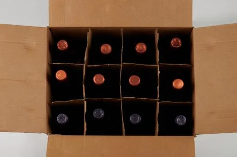 Wine bottles in open case Stock Photos