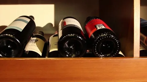 Wine bottles on a shelf Stock Footage 46073016