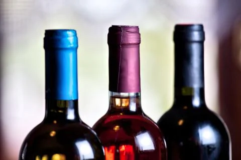 Wine bottles on a table. High quality photo. Stock Photos