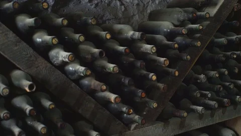 Wine bottles in wine cellar Stock Footage 76325437