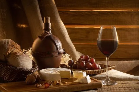 Wine bread cheese grapes Stock Photos
