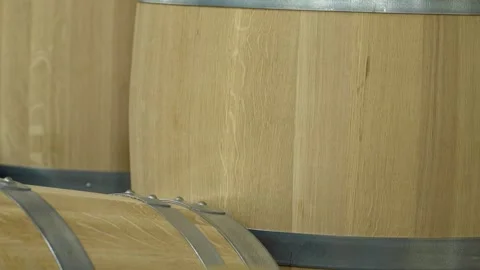 A Wine Cellar. Storage Room for Wine in Bottles and Barrels. Old wine Stock Footage 227944493