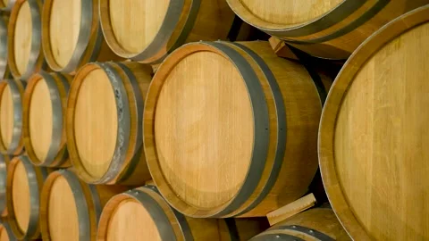 A Wine Cellar. Storage Room for Wine in Bottles and Barrels. Old wine Stock Footage 227949569