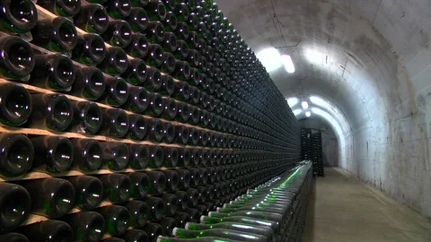 Wine Cellars of the Winery. Old Bottles with Champagne  Stock Footage 74546112