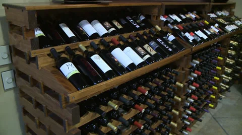 WINE CELLER WITH BOTTLES ON SHELF AGING AT WINERY IN CALIFORNIA Video stock 35404768