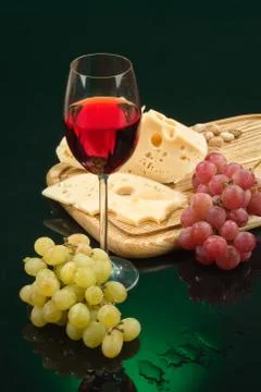 Wine, Cheese And Grapevine Stock Photos