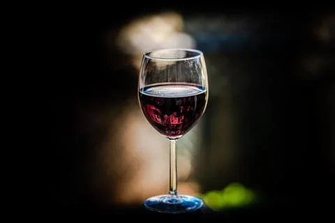 Wine class in the black background  Stock Photos