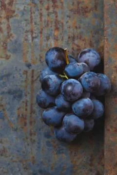 Wine concept - wine, grape on rustik dark background. Top wiew Stock Photos