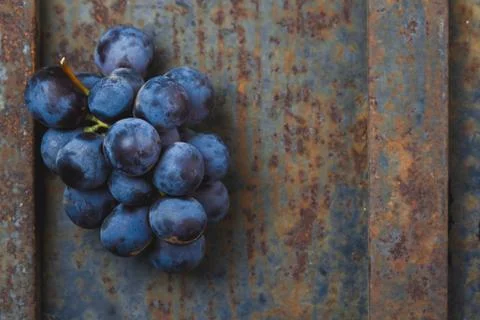 Wine concept - wine, grape on rustik dark background. Top wiew Stock Photos